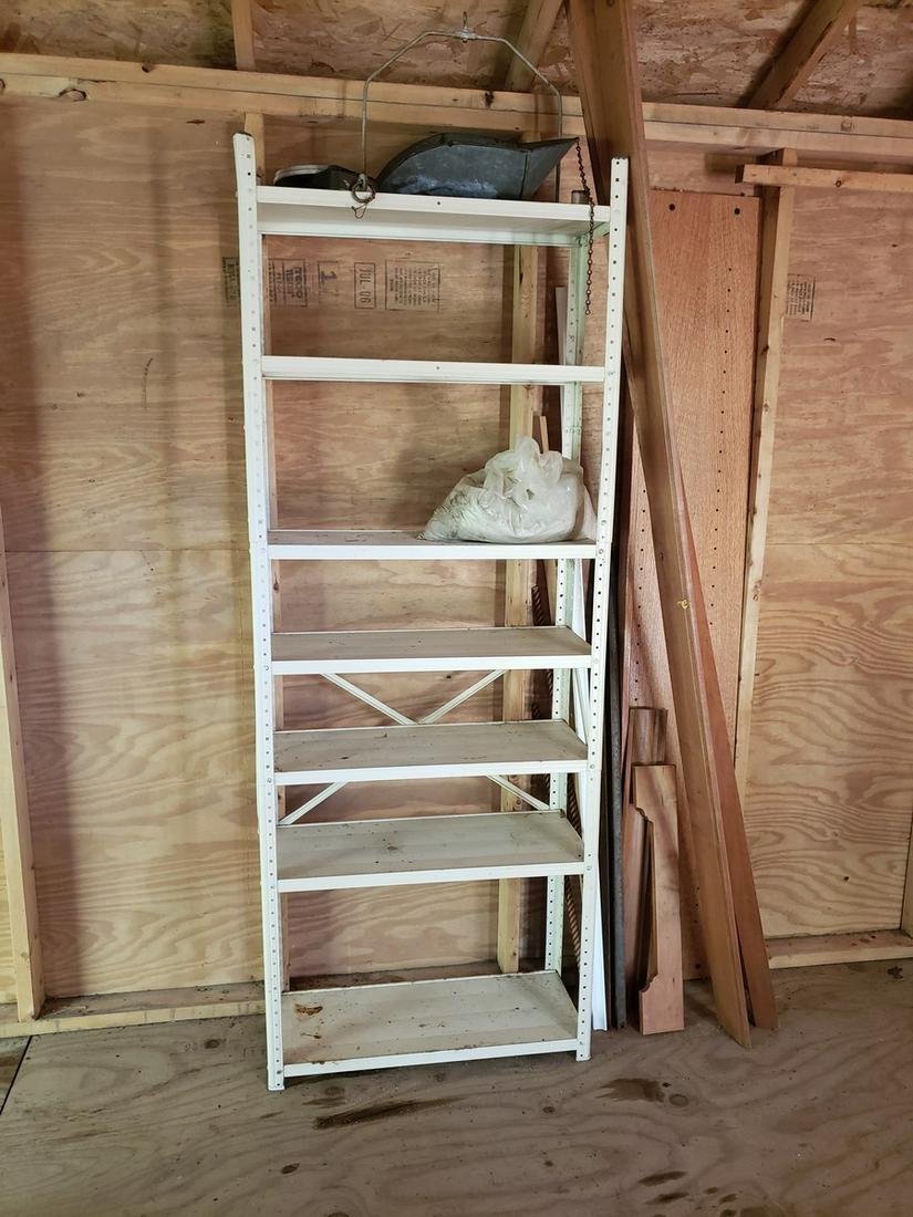 Large white metal shelving: Large white metal shelving used in back shed