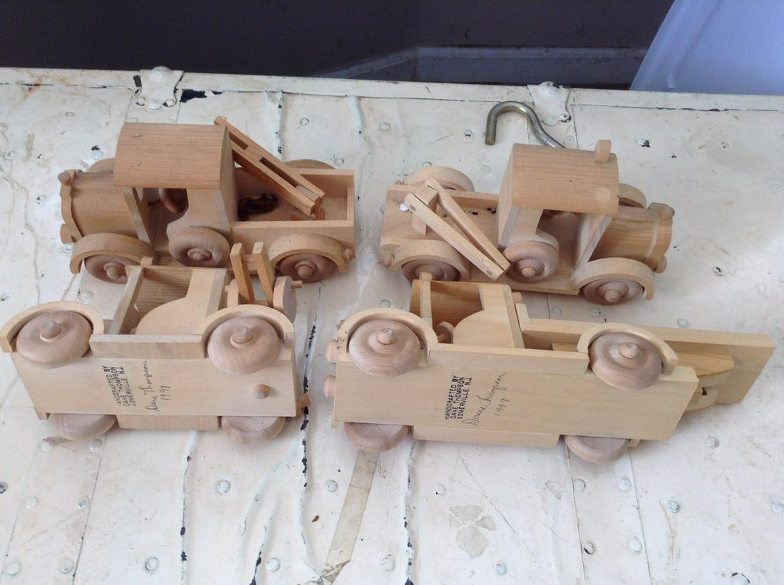 hand made wooden tow trucks signed by the artist: hand made wooden tow trucks signed by the artist