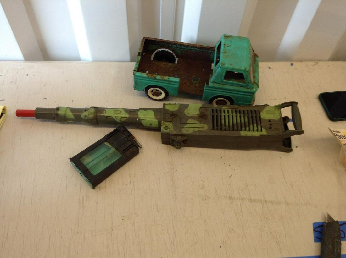 structo truck and 1960's toy military machine gun with: structo truck and 1960's toy military machine gun with ammo