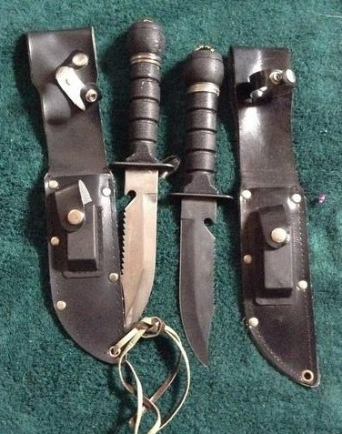 two combat knives with compasses in the handles: two combat knives with compasses in the handles