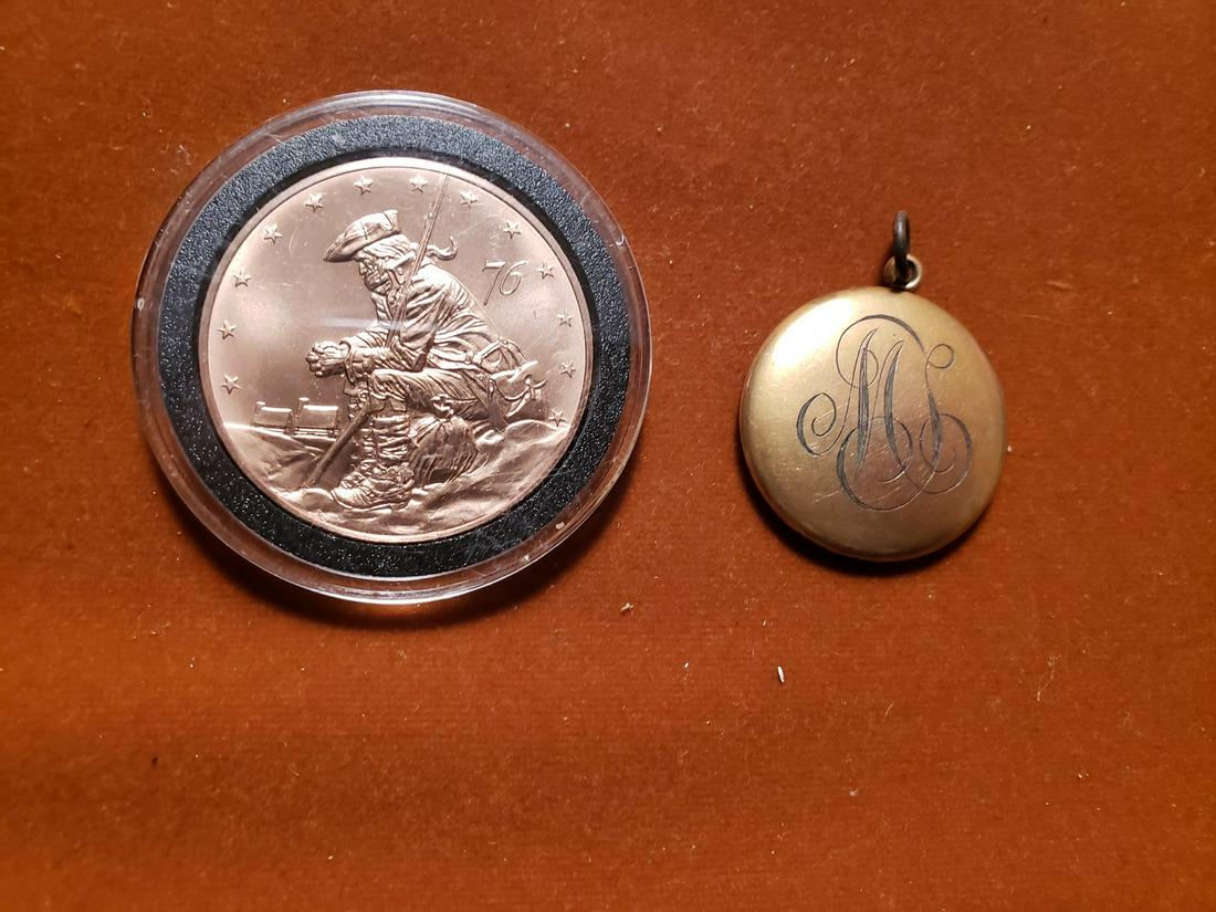 Locket and 76 coin: Locket and 76 coin
