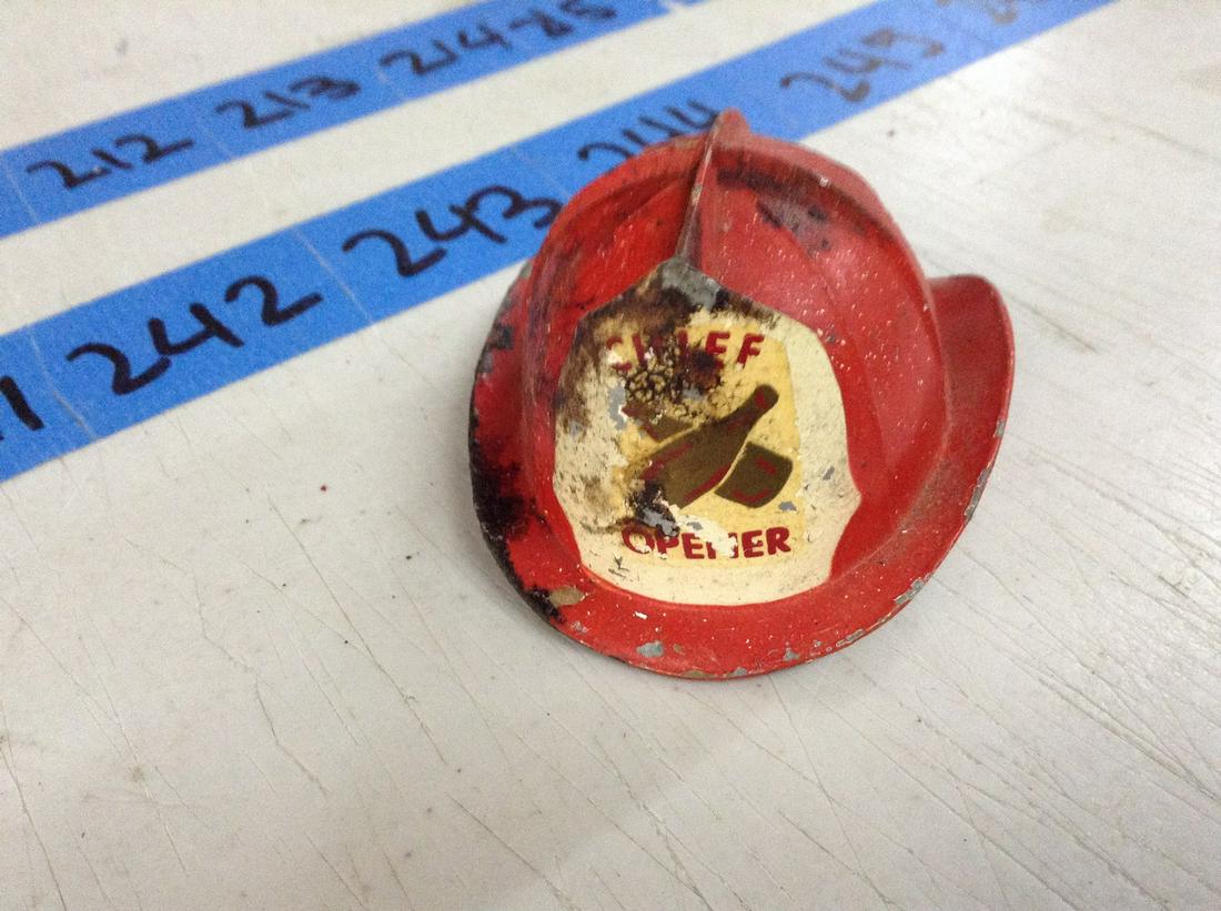 cast iron firefighter helmet bottle cap opener: cast iron firefighter helmet bottle cap opener