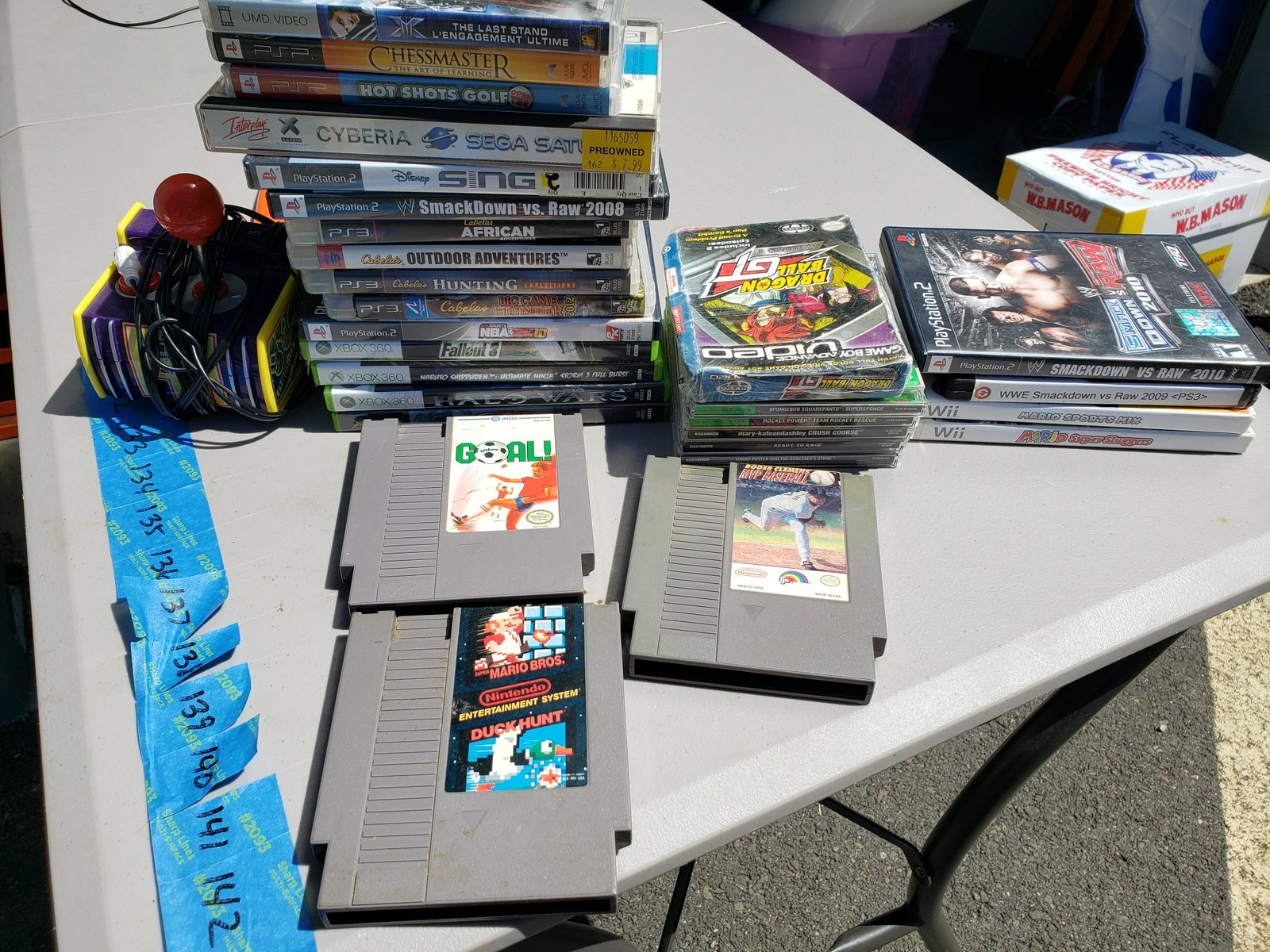Lot of video games: Lot of video games - ones to right Wii Mario and WWE games do not have discs inside