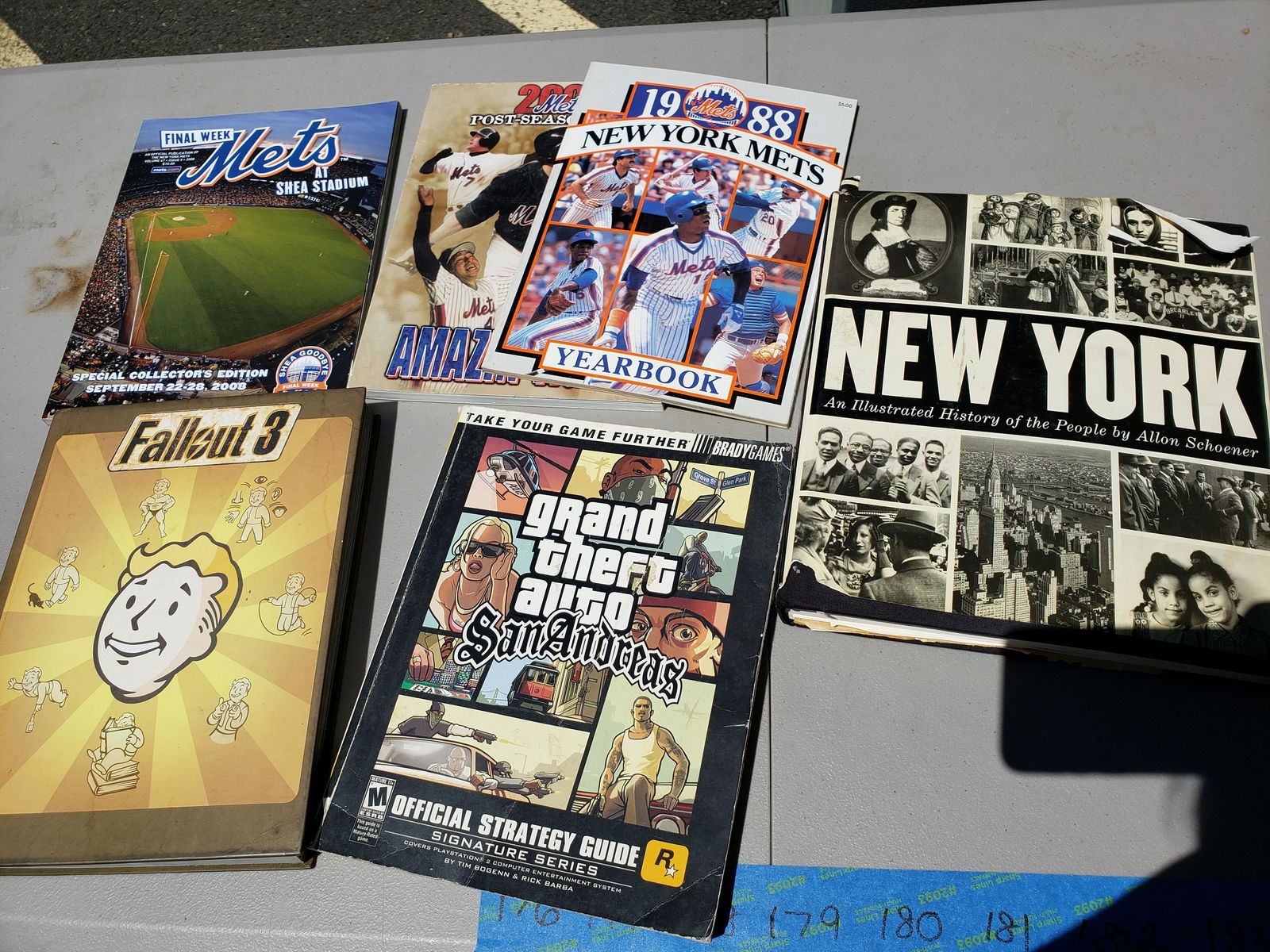 Lot of Mets yearbooks and gaming books (1 of 1)