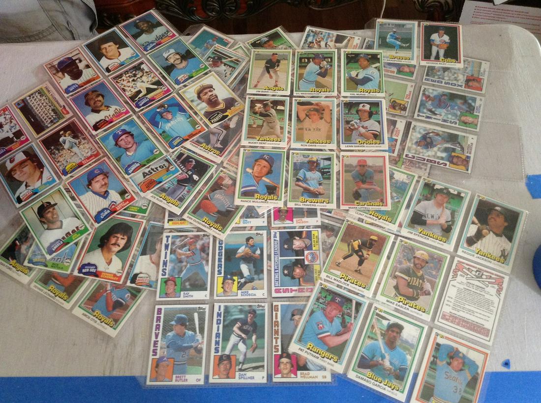large amount of baseball cards in protective sleeves (1 of 1)
