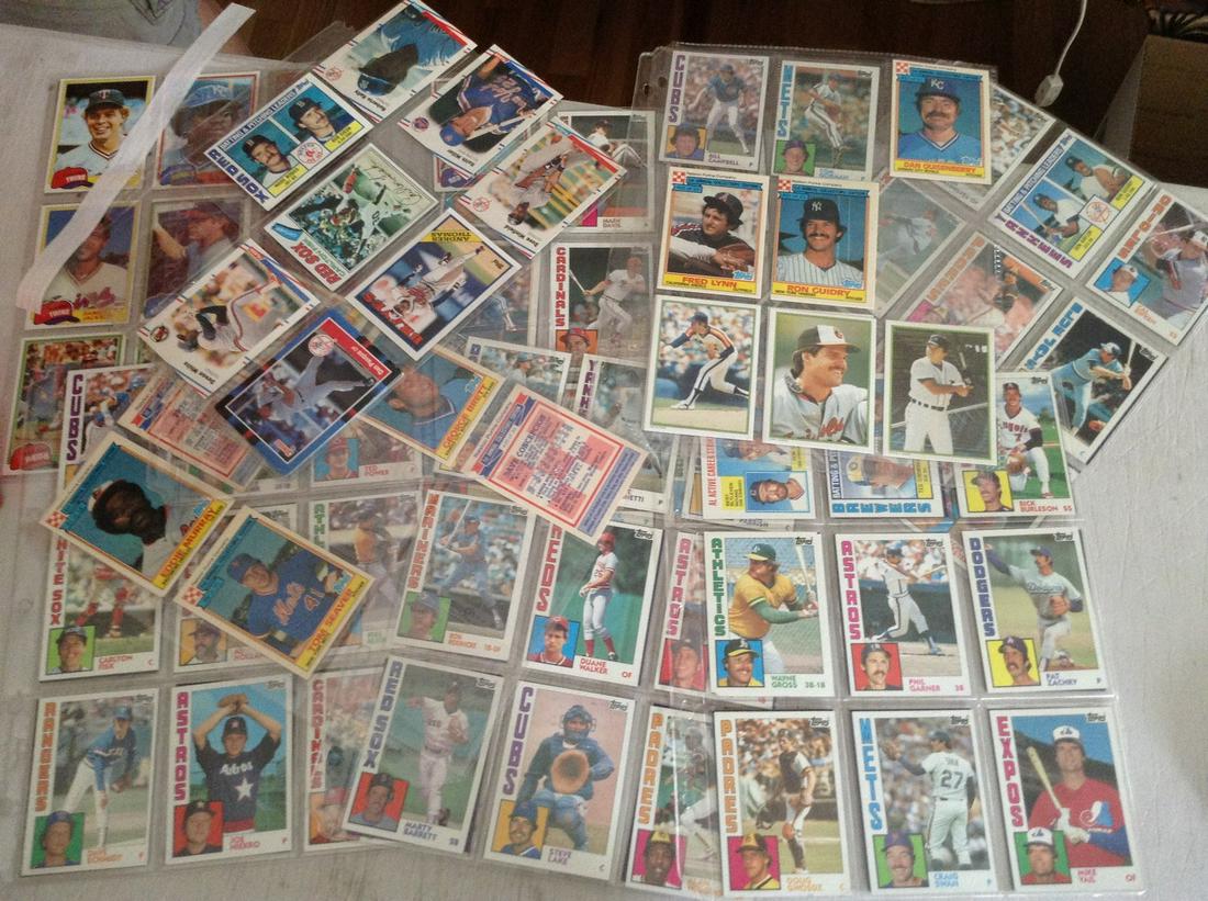 large amount of baseball cards in protective sleeves (1 of 1)