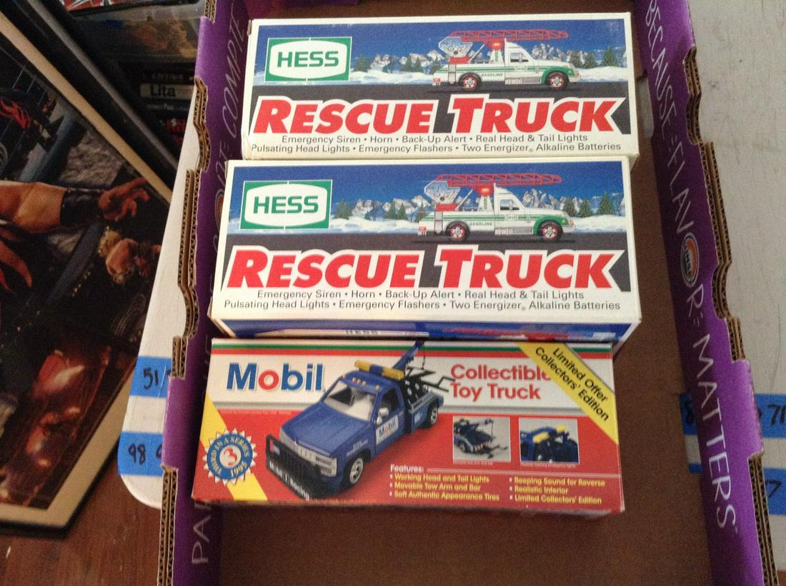 two Hess trucks and Mobil toy truck (1 of 1)