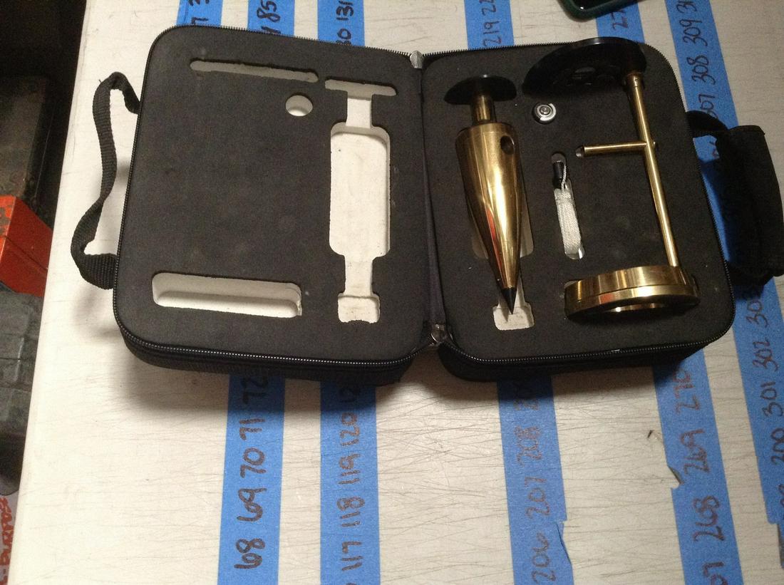 laser mark plumb bob in case: laser mark plumb bob in case