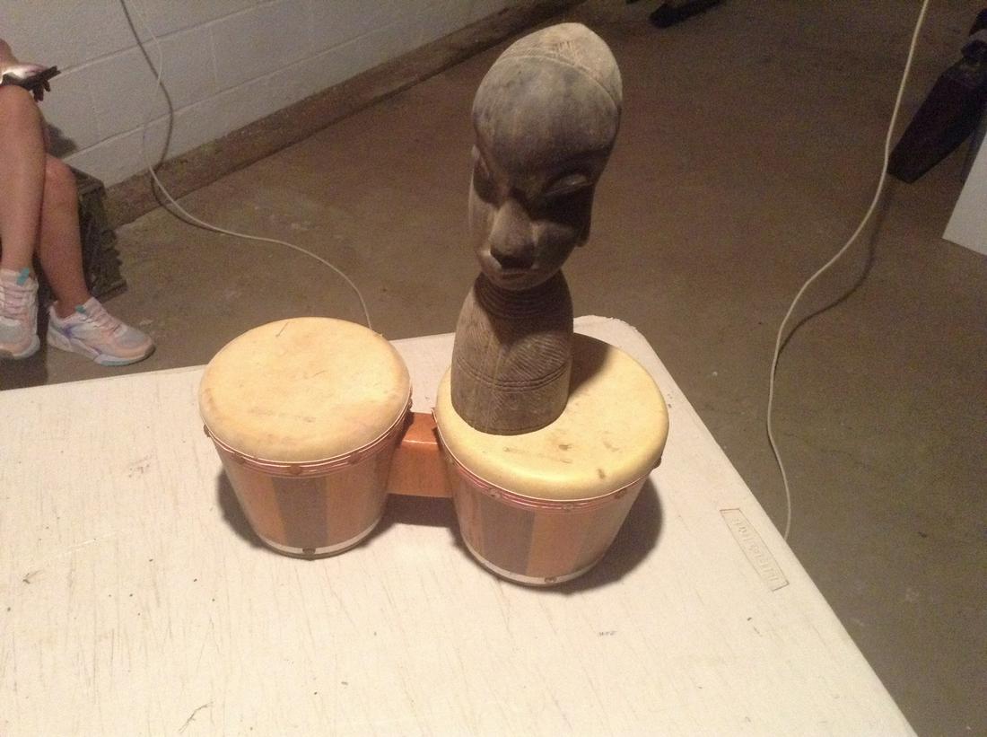protesting bongos and hand carved wooden statues tands: protesting bongos and hand carved wooden statues tands 9" tall