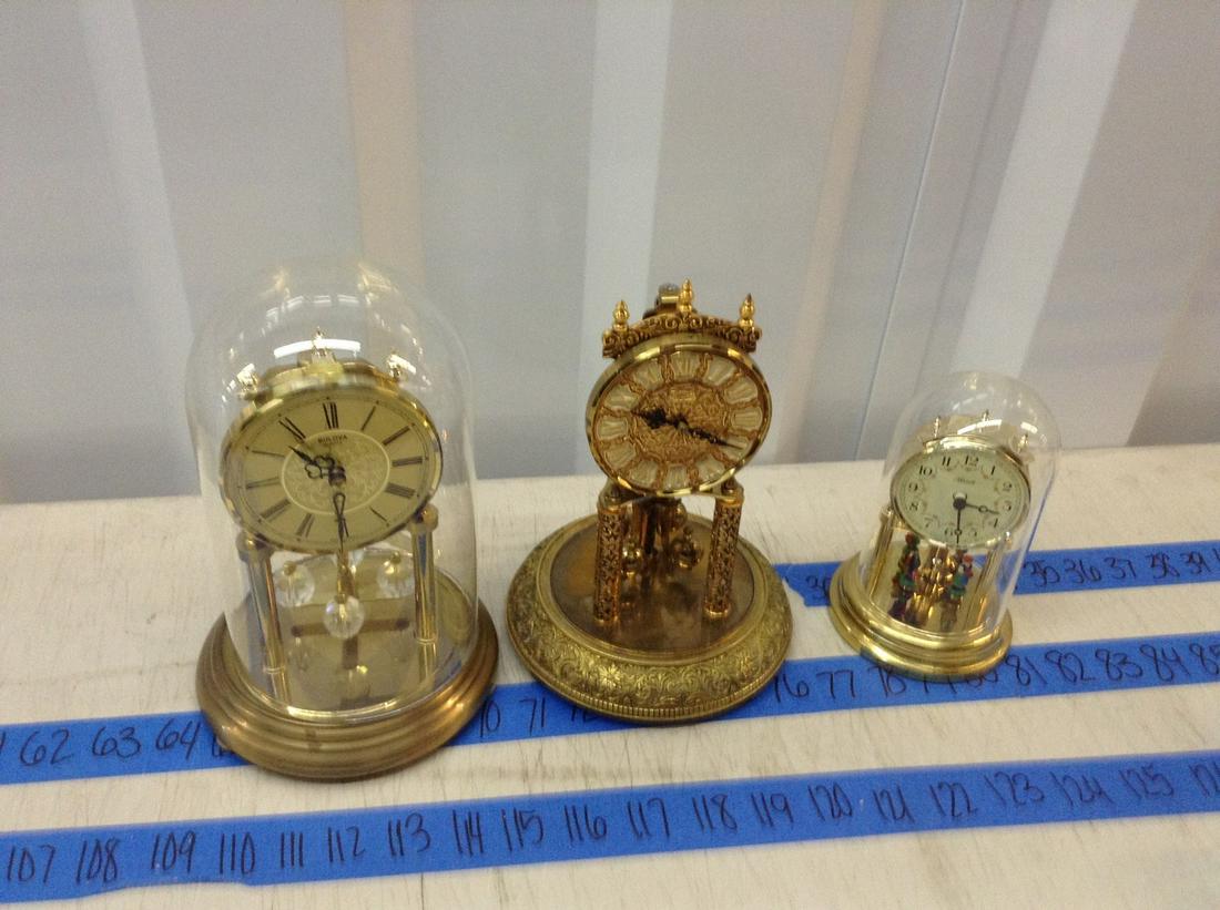 bulova quartz and other vintage clocks: tallest is 10"