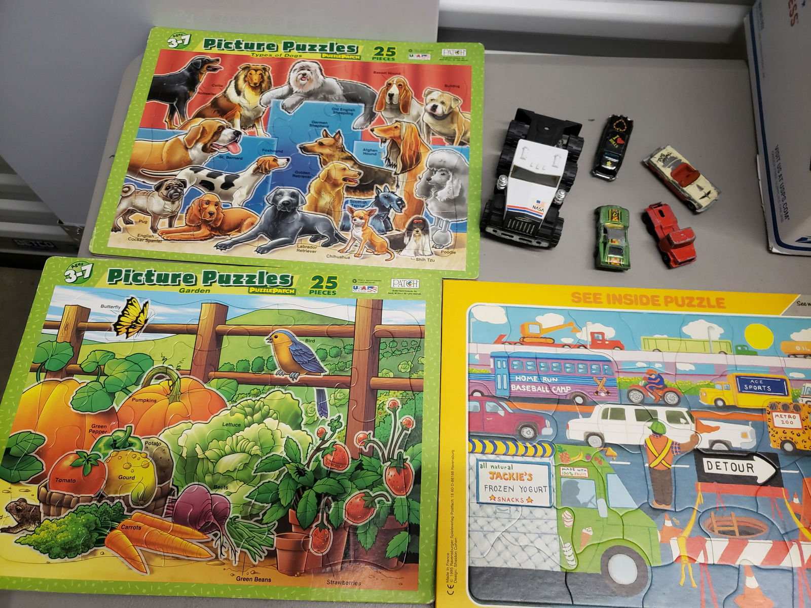 Lot of early puzzles w/vintage cars (1 of 1)