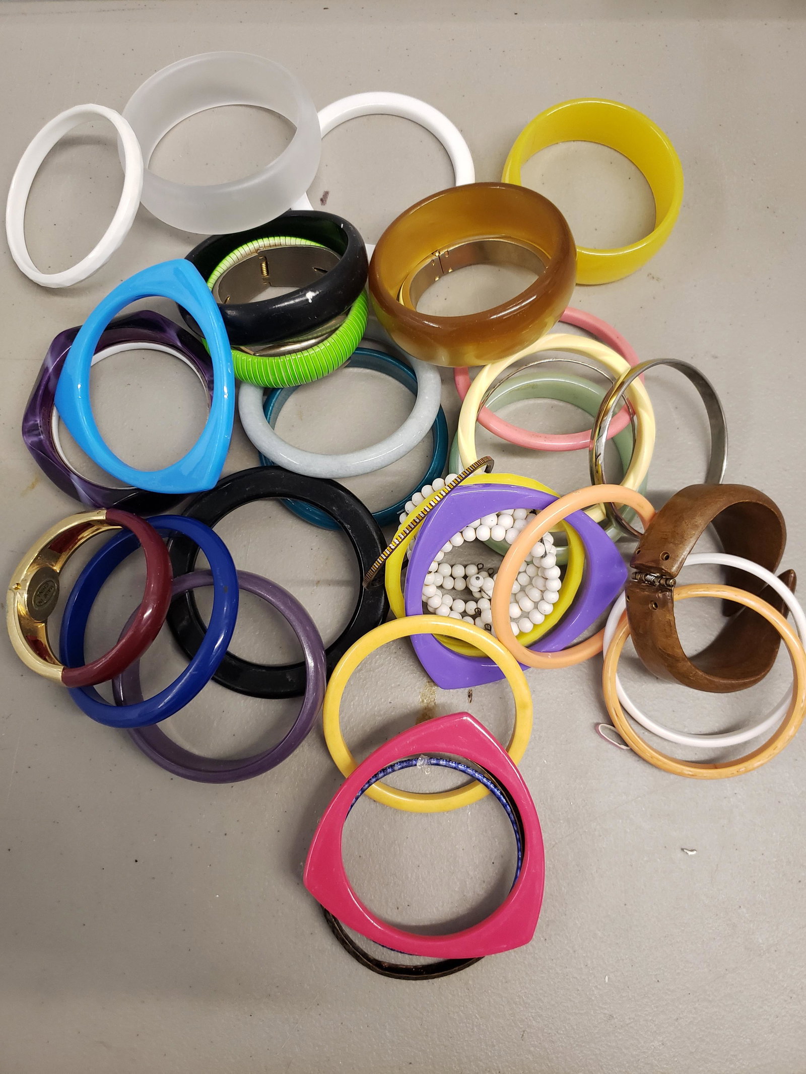 Lot of costume bracelets - possible some bakelite did: Lot of costume bracelets - possible some bakelite did not test