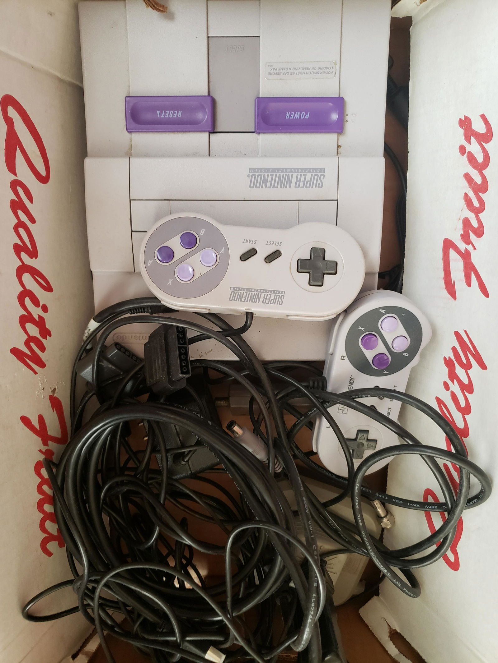 Super Nintendo Console, cords, and two controllers (1 of 1)