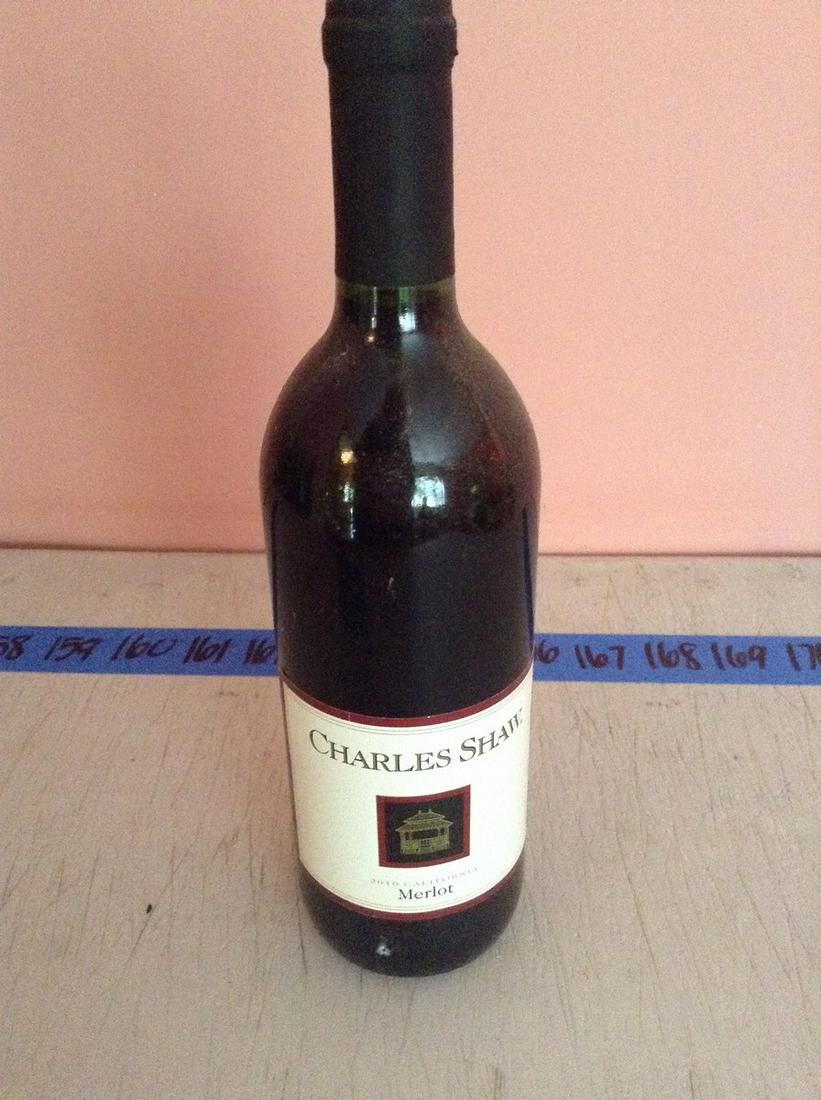 Charles Shaw Merlot 2010 750 ml: Any contents in bottle is Free; You are bidding on the bottle & unbroken tax stamp