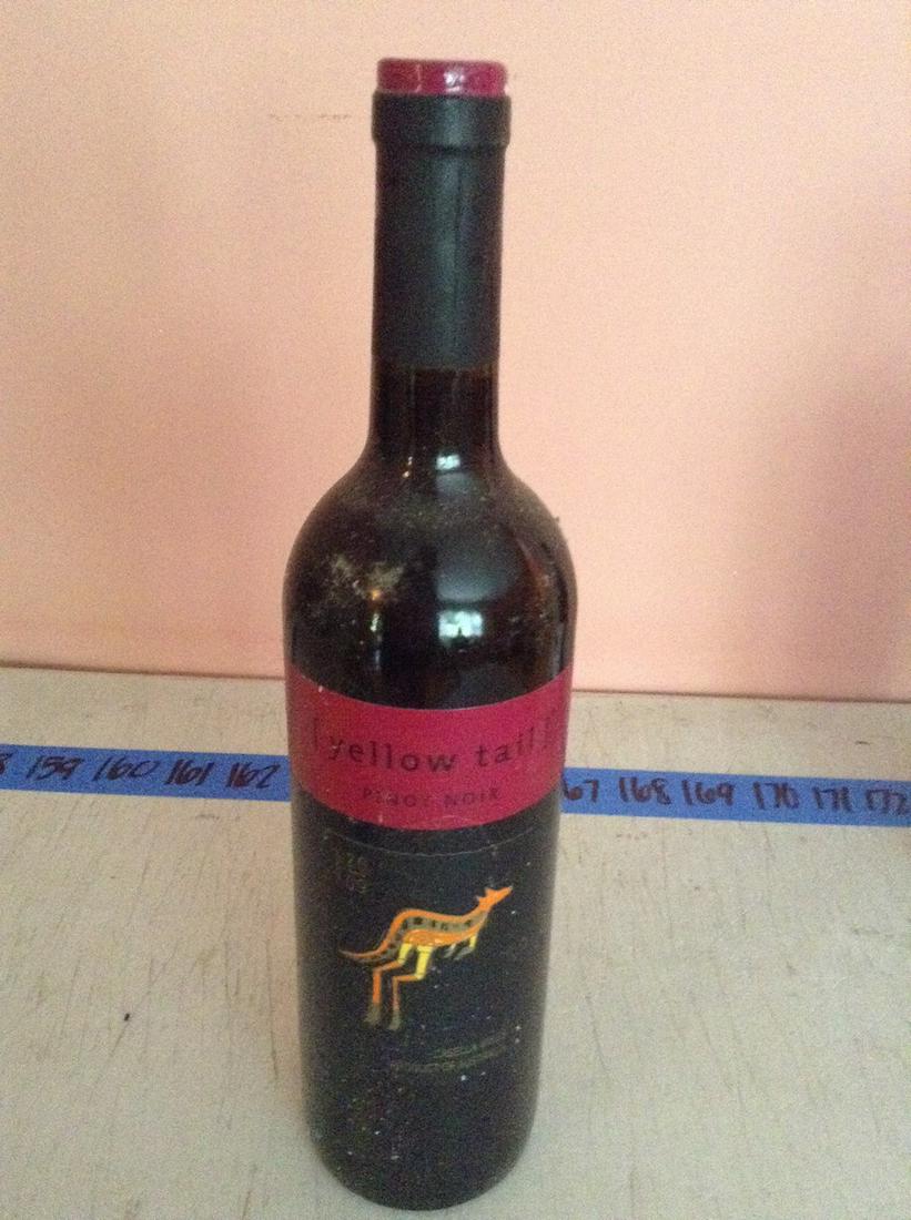 Yellow Tail Pinot Noir 750 ml: Any contents in bottle is Free; You are bidding on the bottle & unbroken tax stamp