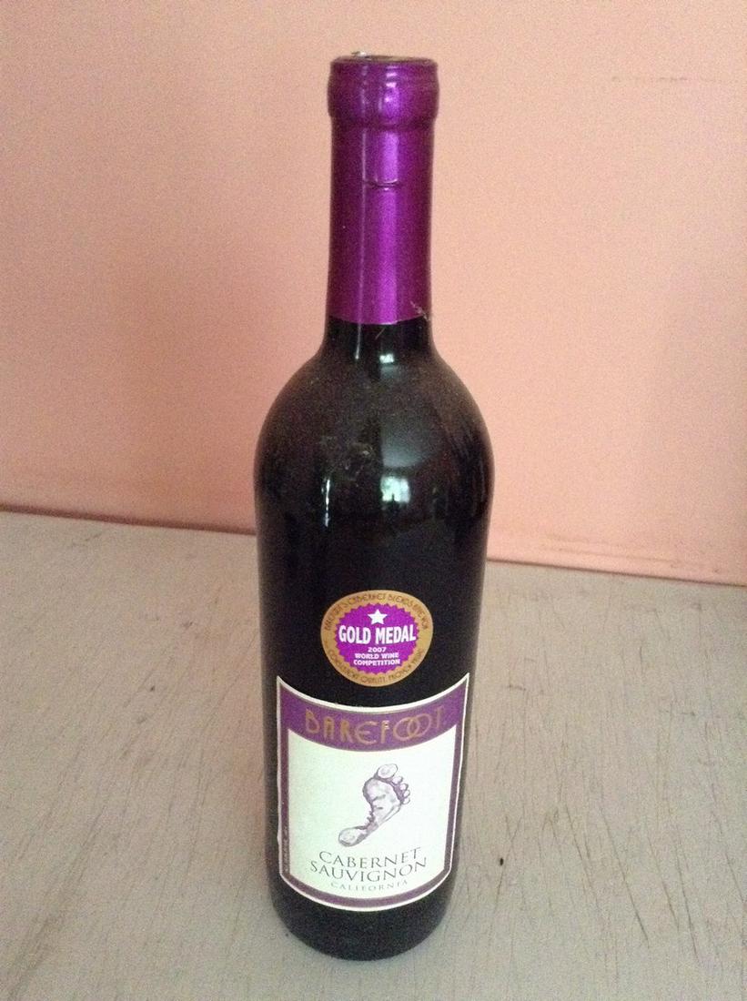 Barefoot 750 ml: Any contents in bottle is Free; You are bidding on the bottle & unbroken tax stamp