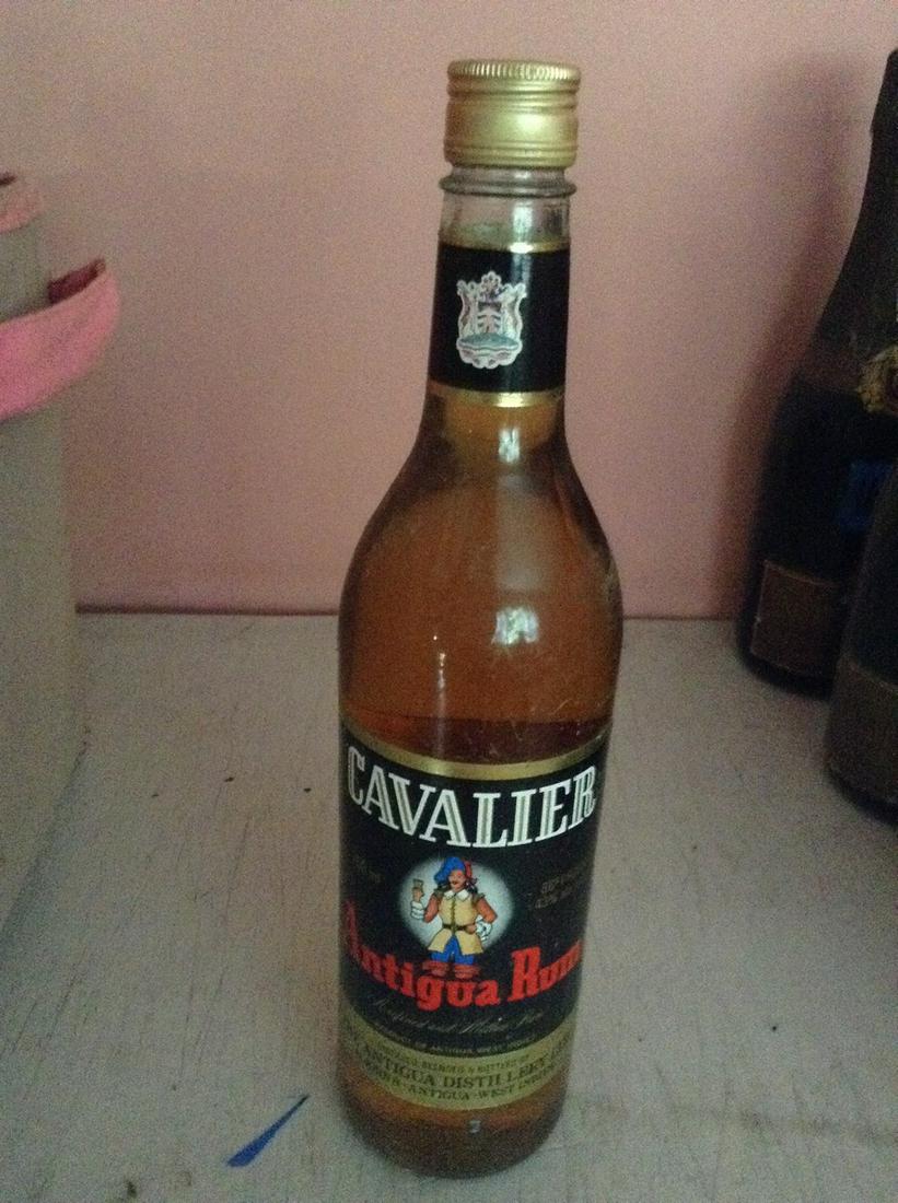 Cavalier Rum 750 ml: Any contents in bottle is Free; You are bidding on the bottle & unbroken tax stamp