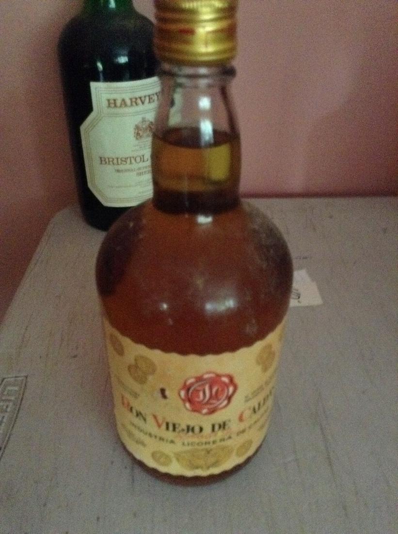 Ron Viejo De Caldas 750 ml: Any contents in bottle is Free; You are bidding on the bottle & unbroken tax stamp