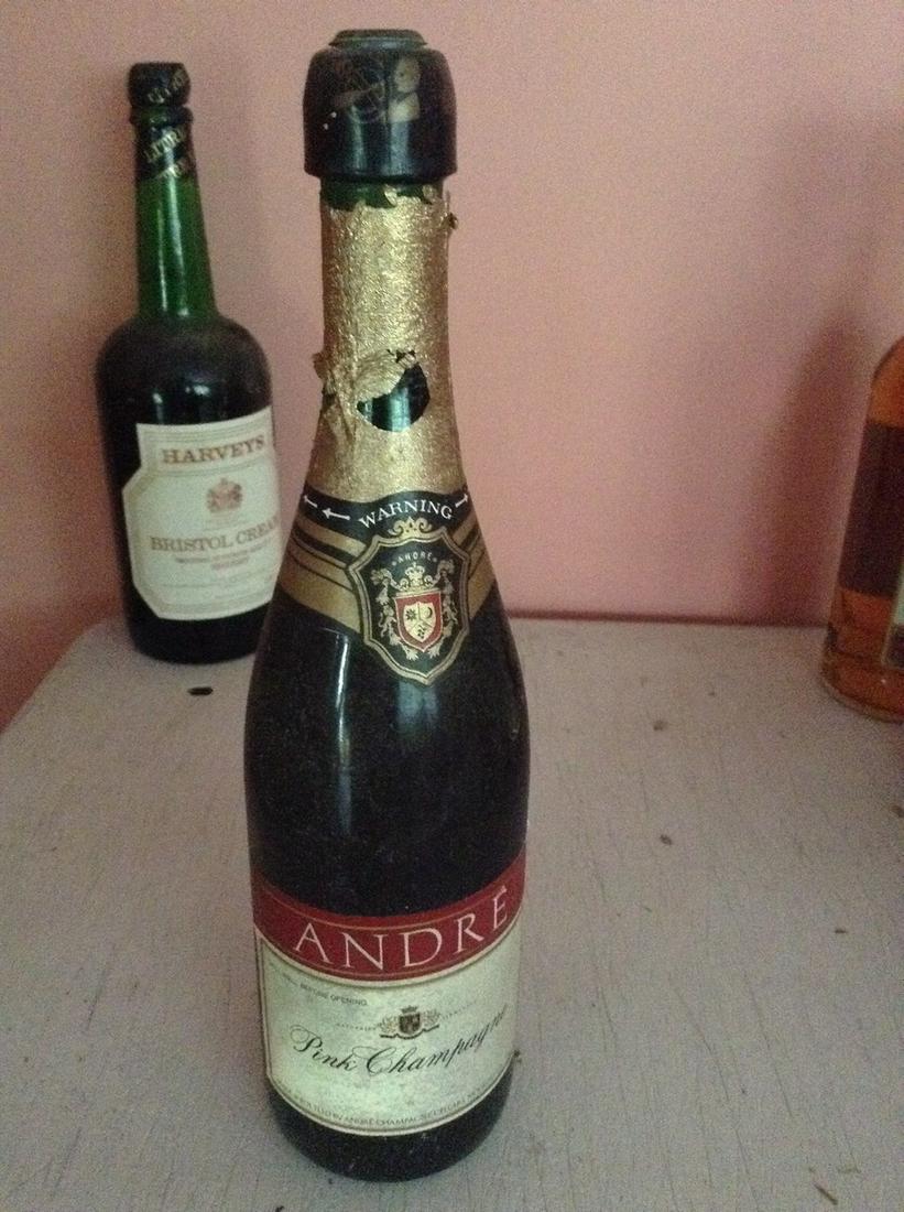 Andre Pink Champagne 750 ml: Any contents in bottle is Free; You are bidding on the bottle & unbroken tax stamp