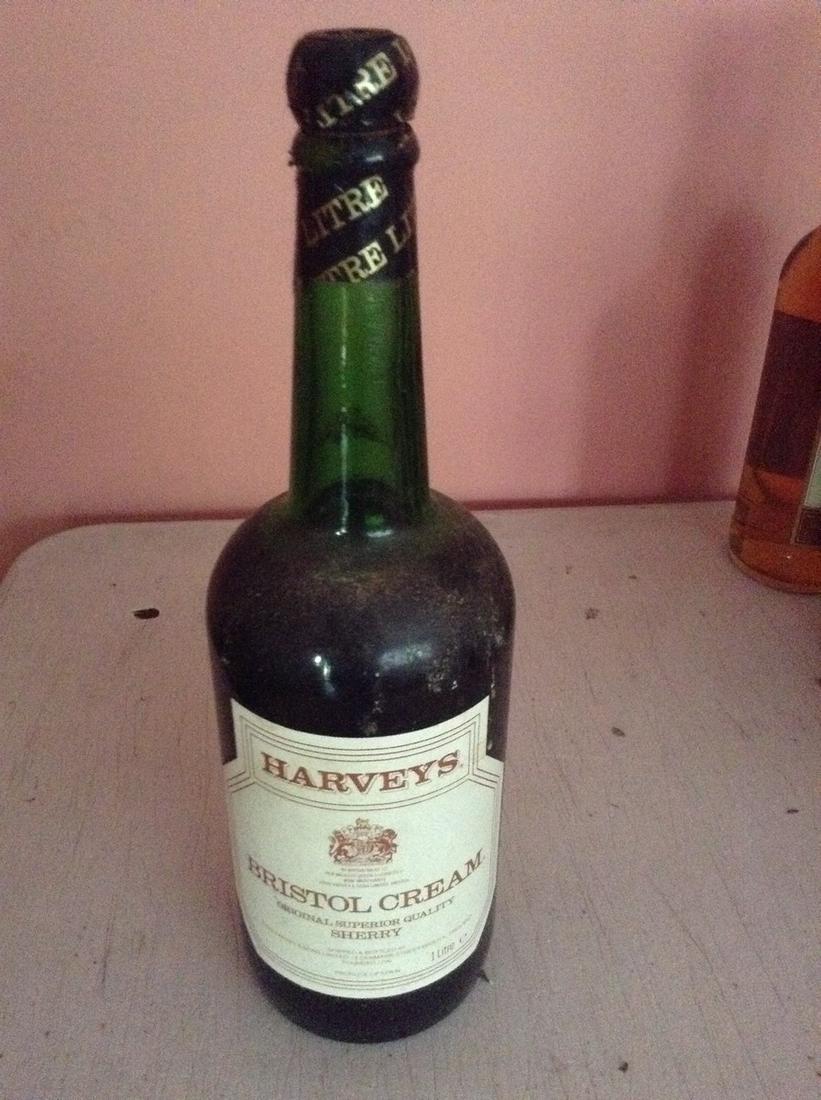 Harveys Bristol Cream 1 liter: Any contents in bottle is Free; You are bidding on the bottle & unbroken tax stamp