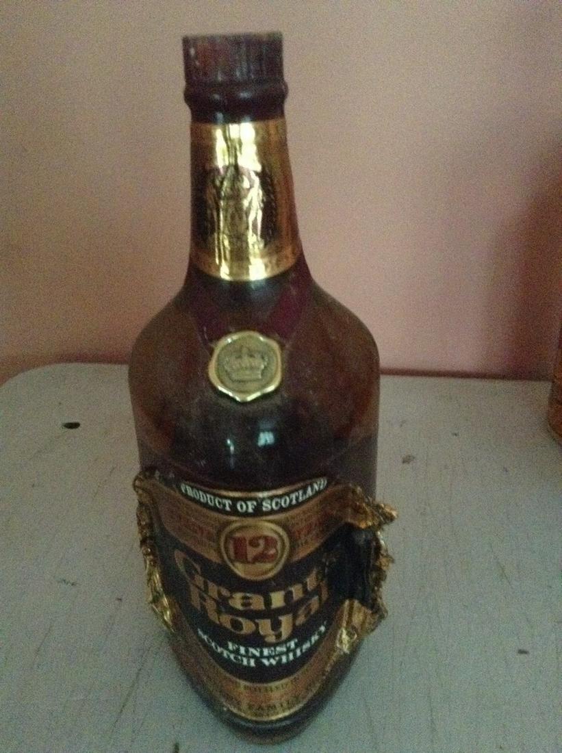 Grant's Royal Finest Scotch Whiskey 1 liter: Any contents in bottle is Free; You are bidding on the bottle & unbroken tax stamp