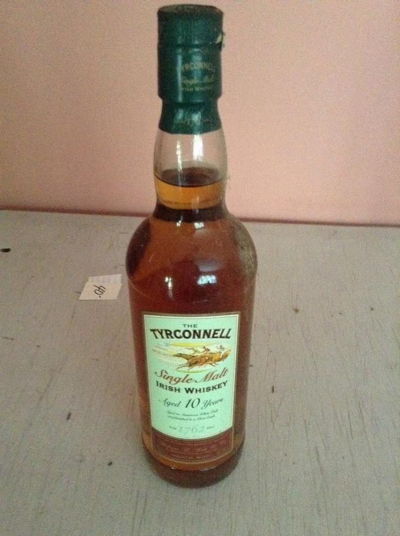 The Tyrconnell Single Malt Irish Whiskey 750 ml: Any contents in bottle is Free; You are bidding on the bottle & unbroken tax stamp