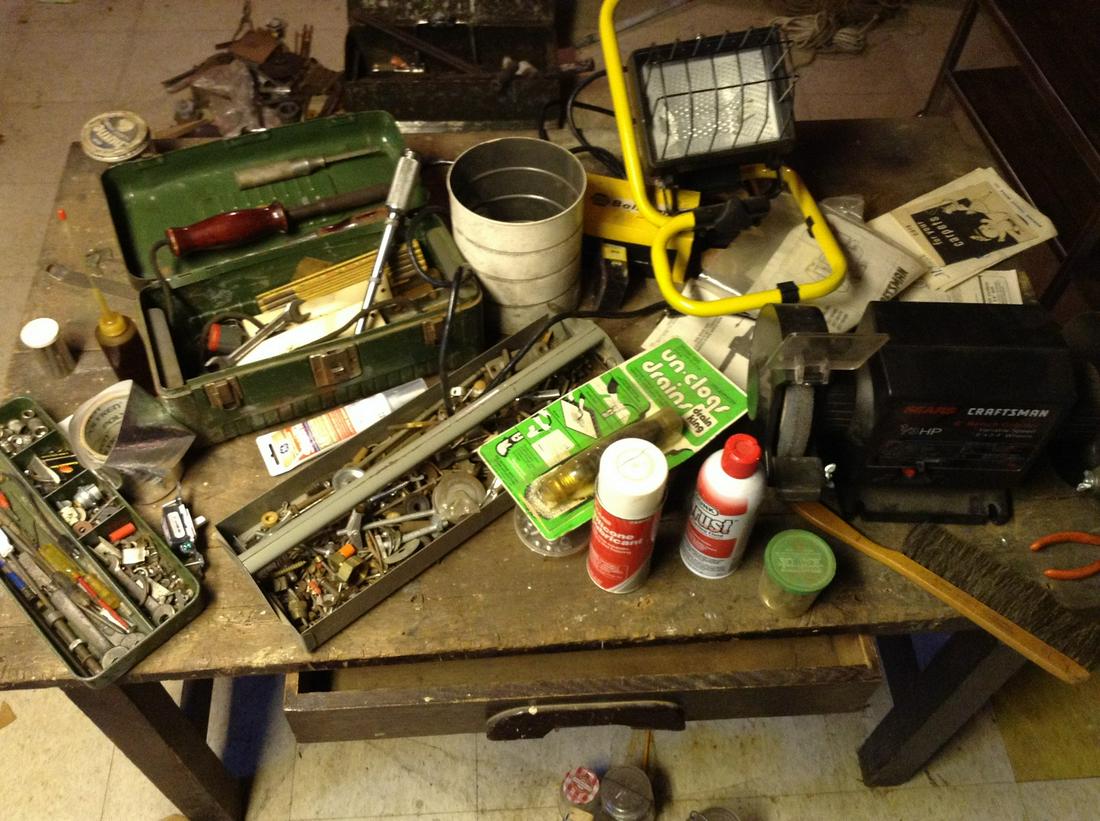 contents of top of workbench with grinders and more: contents of top of workbench with grinders and more