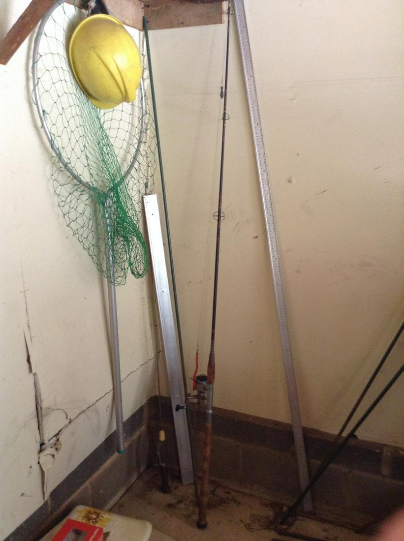 fishing poles and fishing net: fishing poles and fishing net