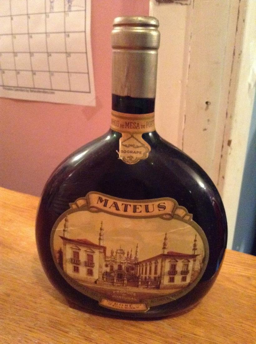 1950s mateus rose still wine 1pt 9 fl oz: Any contents in bottle is Free; You are bidding on the bottle & unbroken tax stamp