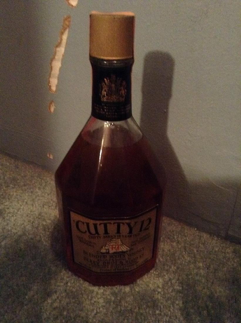 1950 cutty 12 blended scots whisky 4/5 quart: Any contents in bottle is Free; You are bidding on the bottle & unbroken tax stamp