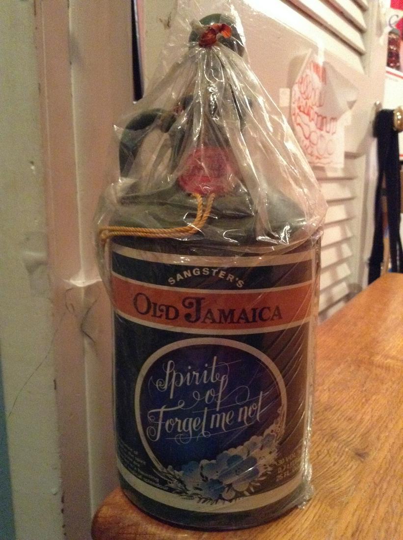 1950s old jamaica spirit of forgetmenot 25 fl oz: Any contents in bottle is Free; You are bidding on the bottle & unbroken tax stamp