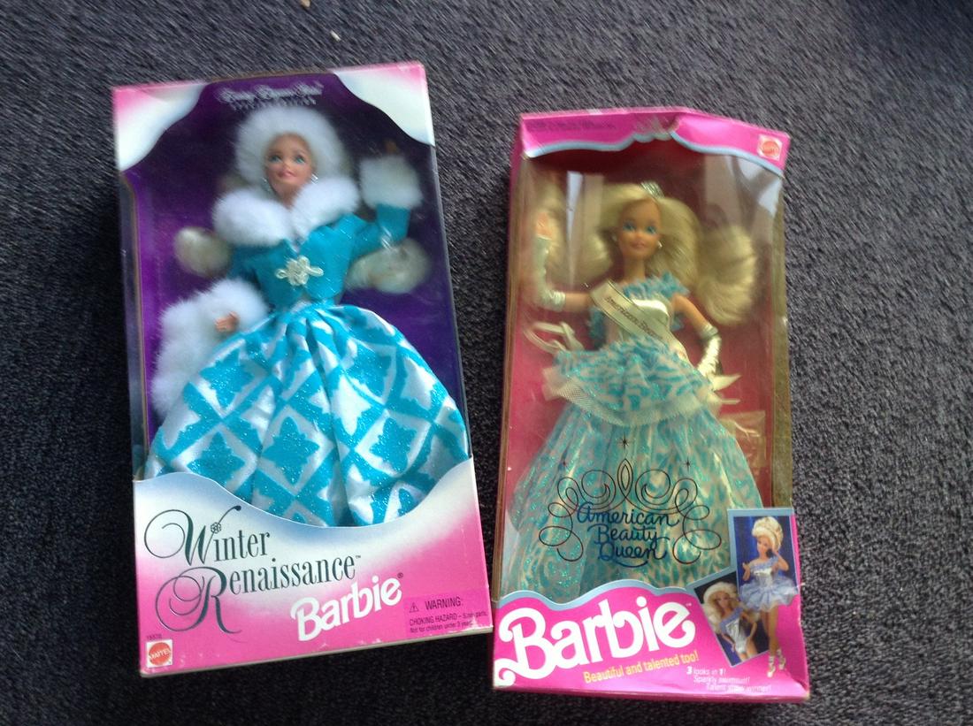 lot of two barbies in the boxes (1 of 1)