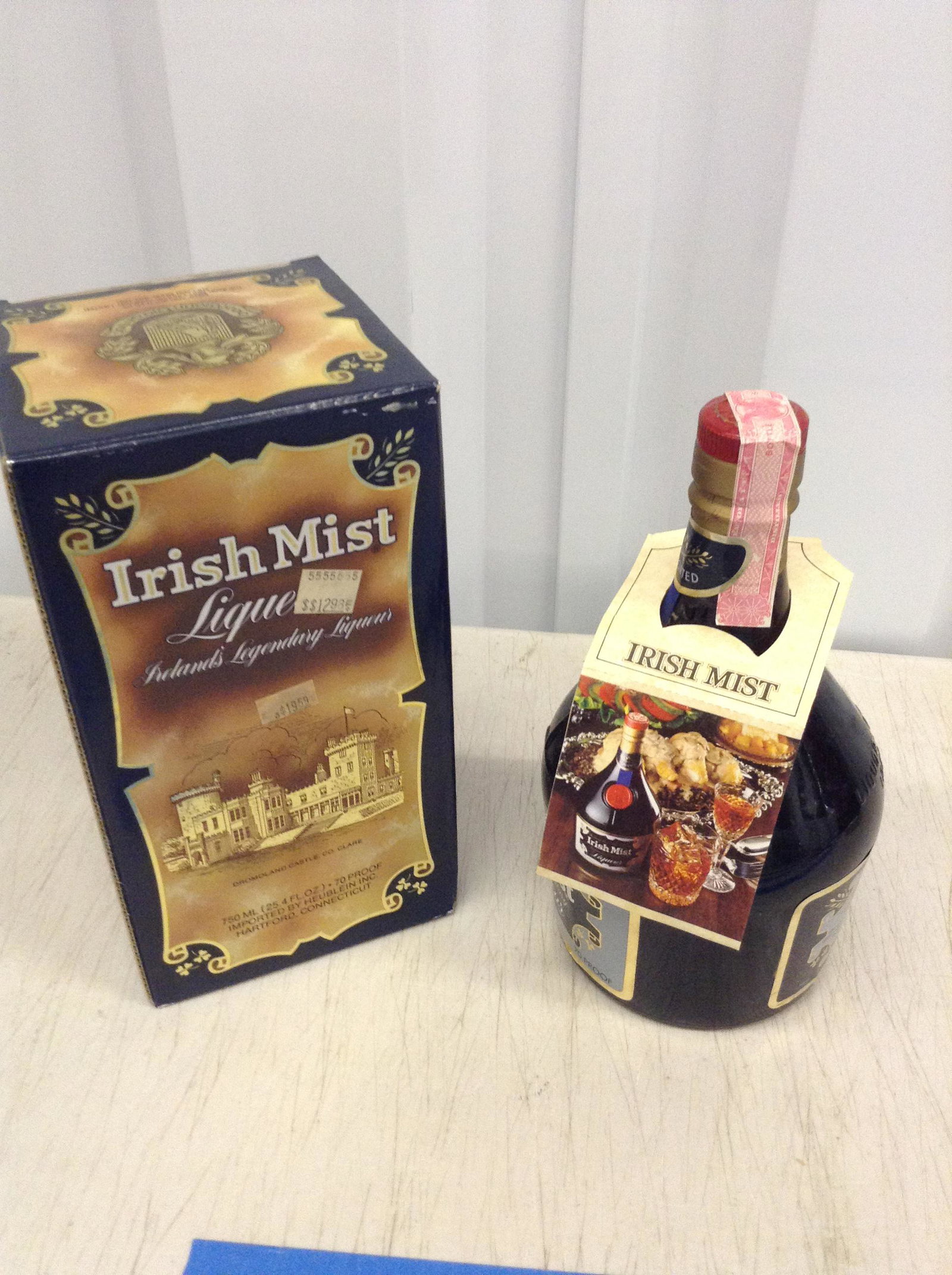 Irish Mist 750 ML With Box: Any contents in bottle is Free; You are bidding on the bottle & unbroken tax stamp