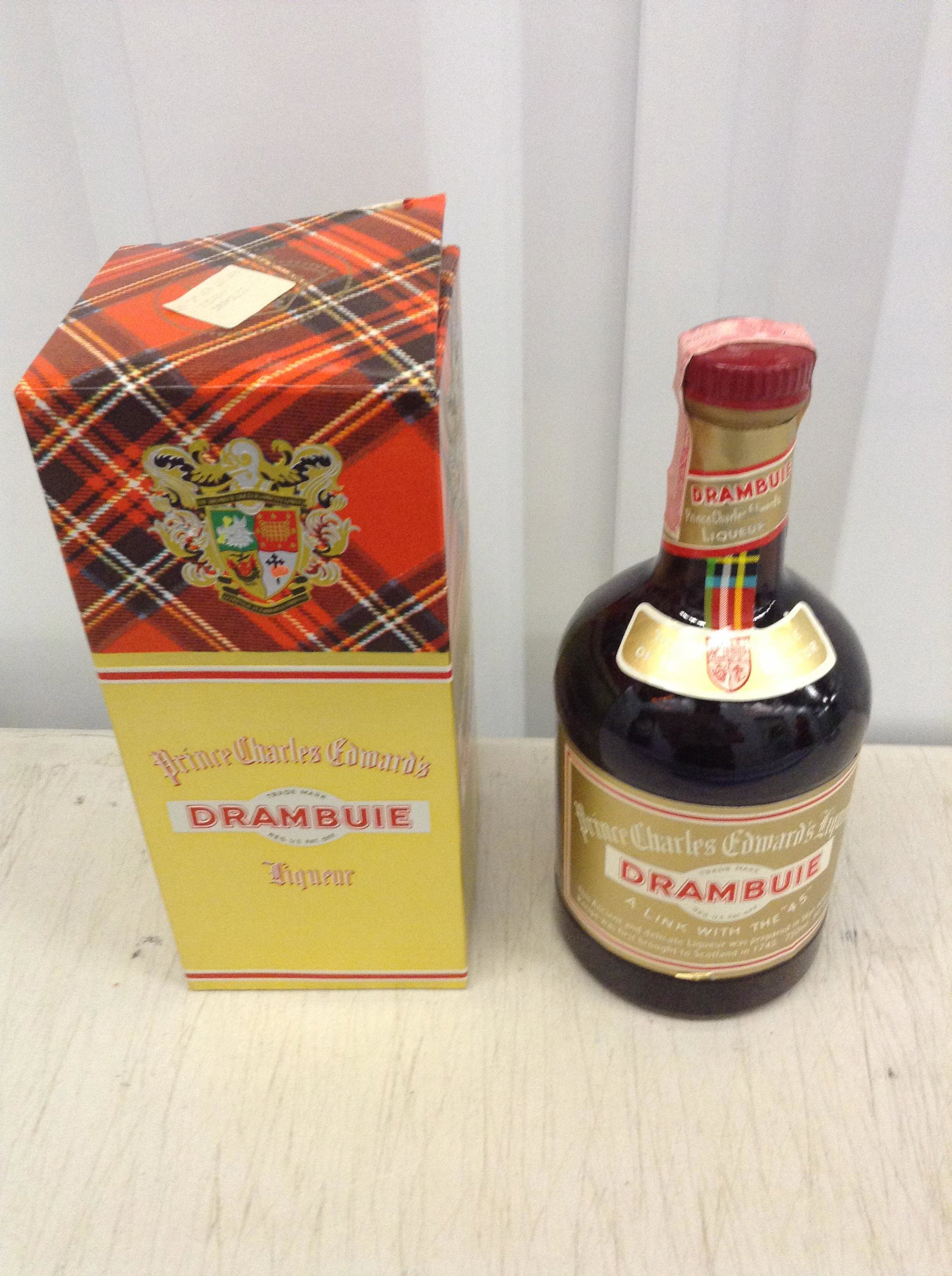 Prince Charles Edward Drambuie Liqueur 750ML With Box: Any contents in bottle is Free; You are bidding on the bottle & unbroken tax stamp