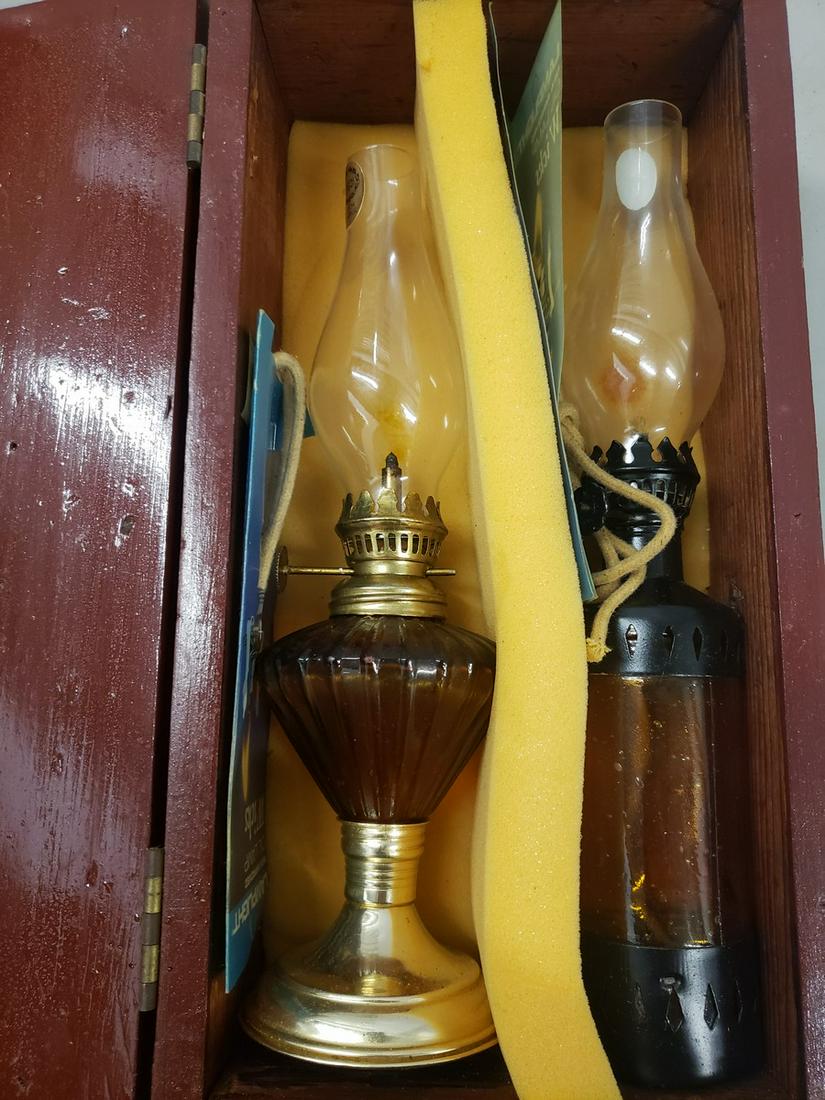Two early oil lamps in box (1 of 1)