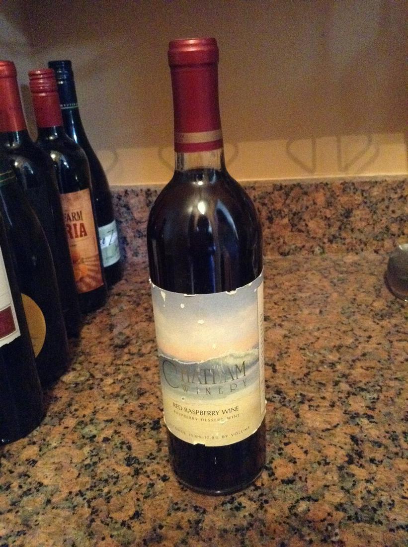 Chatham winery red raspberry wine: Any contents in bottle is Free; You are bidding on the bottle & unbroken tax stamp