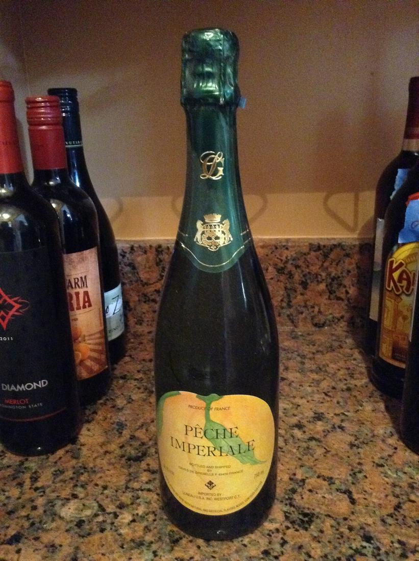 peche imperiale liquor: Any contents in bottle is Free; You are bidding on the bottle & unbroken tax stamp