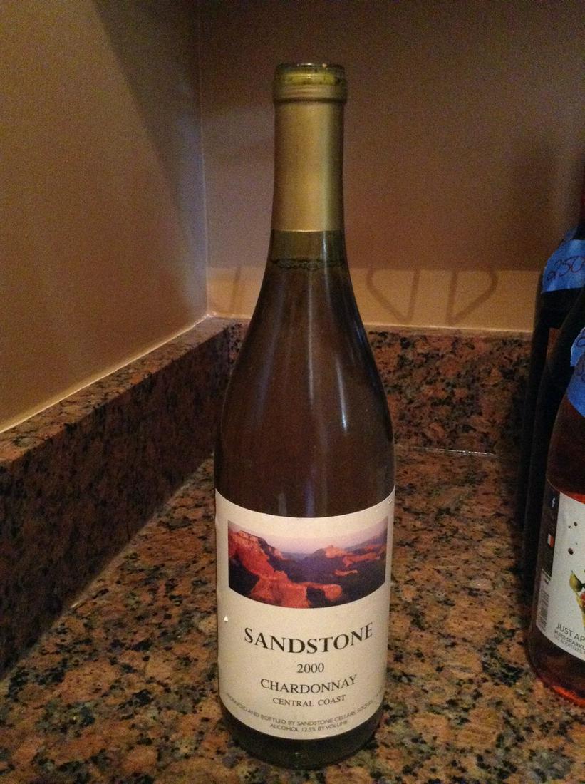 sandstone 2000 chardonnay: Any contents in bottle is Free; You are bidding on the bottle & unbroken tax stamp
