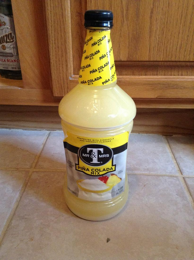 pina colada mix mrs t and t: Any contents in bottle is Free; You are bidding on the bottle & unbroken tax stamp