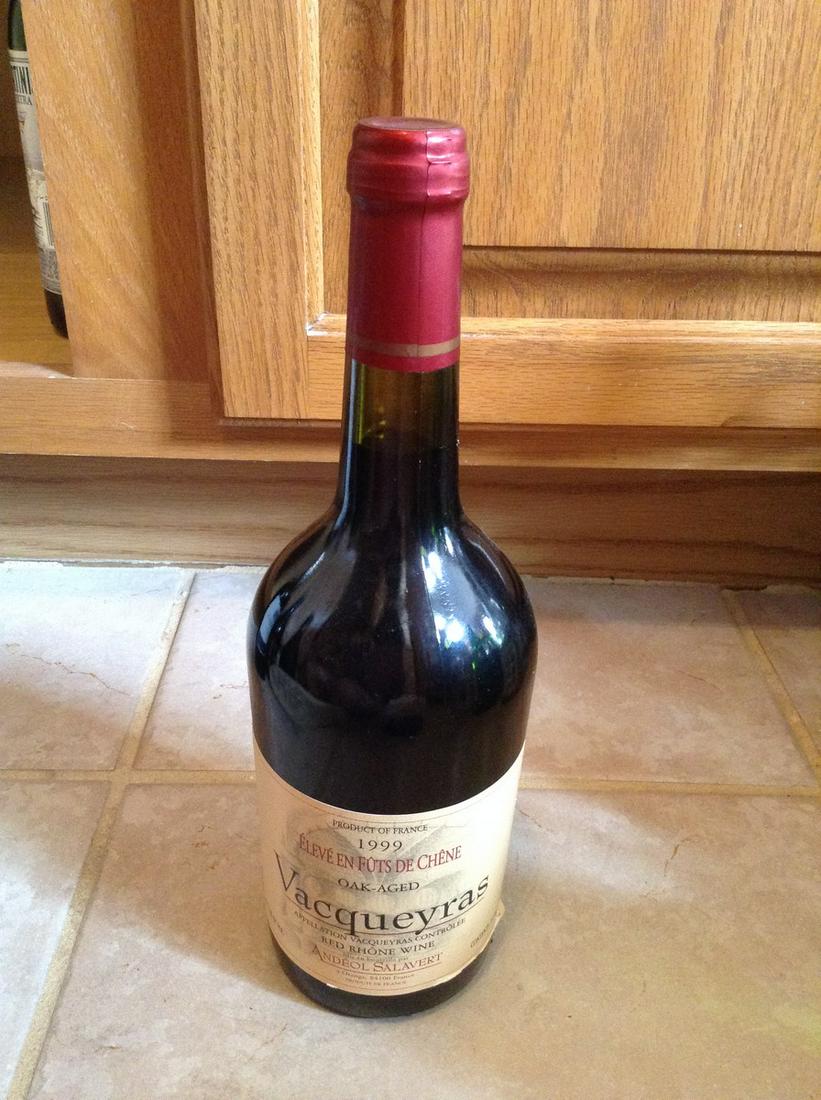 1999 Vacqueyras red rhone wine: Any contents in bottle is Free; You are bidding on the bottle & unbroken tax stamp