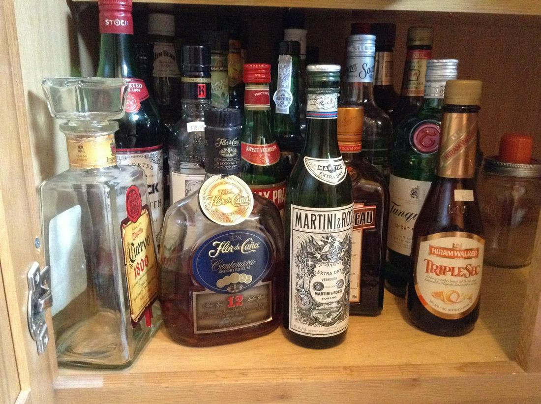lot of vintage liquor bottles opened (1 of 1)