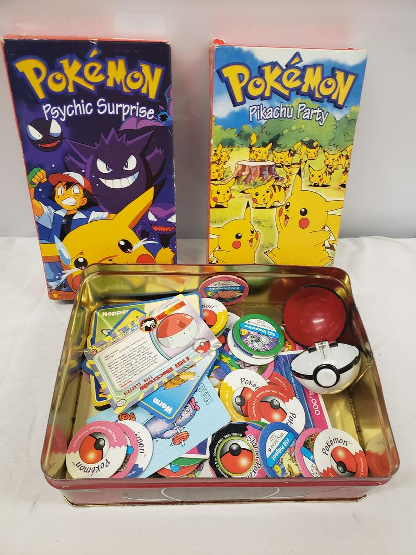 Two early Pokemon VHS tapes with tin fll of vintage (1 of 1)