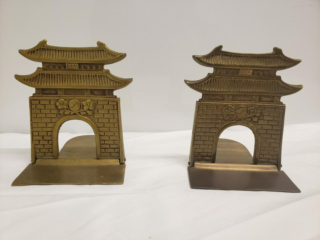 Pair of brass Asian house book ends (1 of 1)