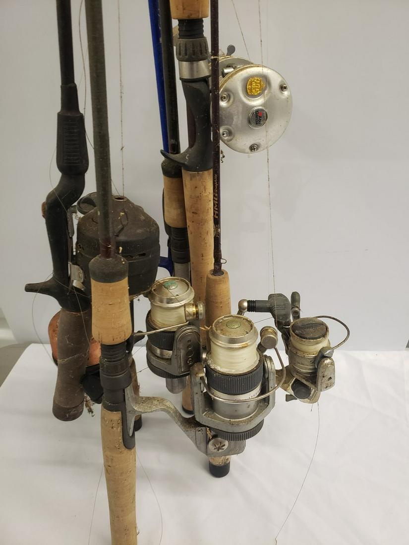 Lot of fishing poles with reels: Lot of fishing poles with reels
