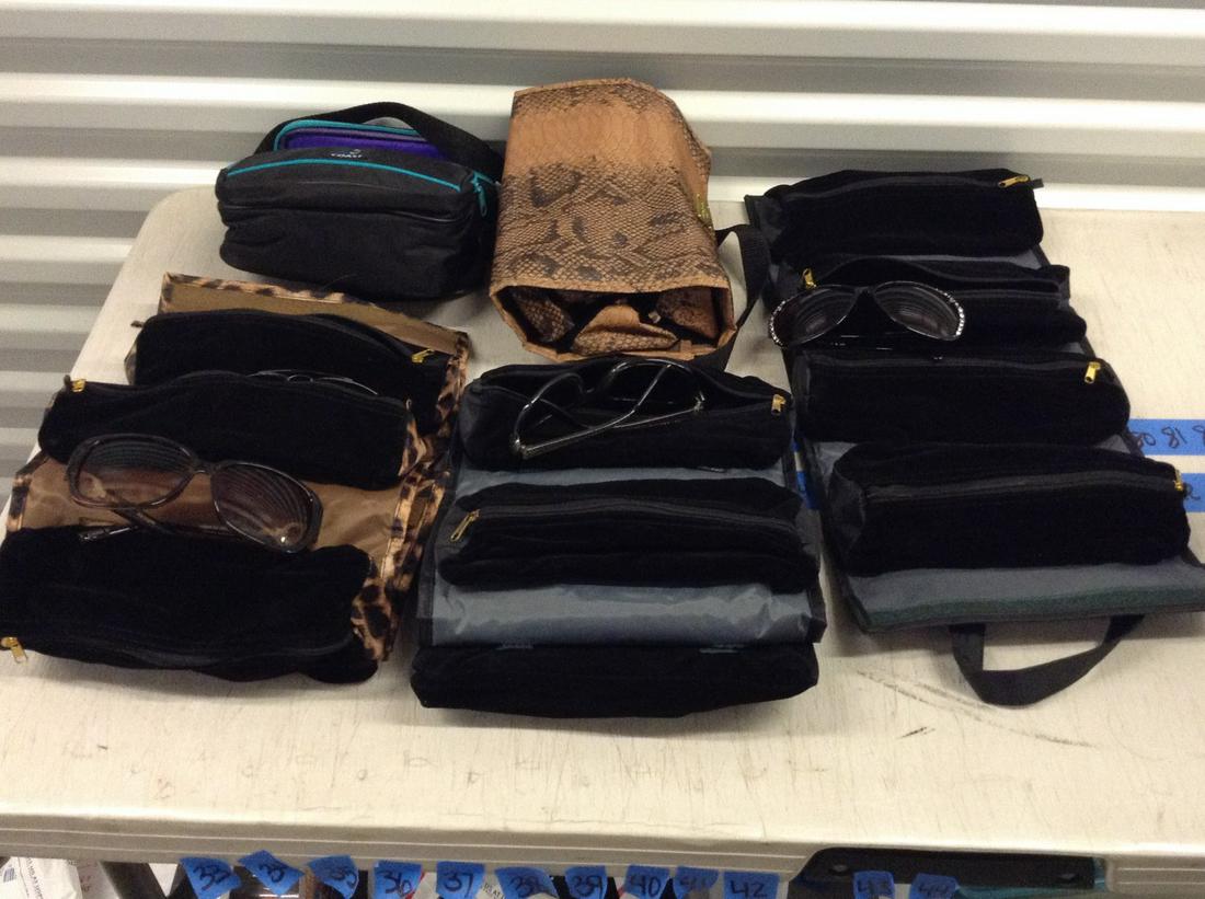 lot of sunglass cases full of sunglasses (J): lot of sunglass cases full of sunglasses (J)