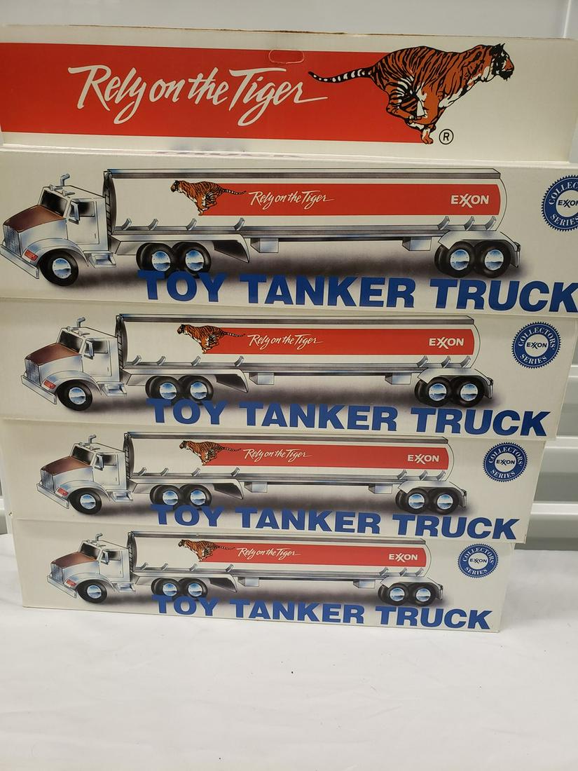 Lot of 4 Exxon Toy tanker trucks: Lot of 4 Exxon Toy tanker trucks