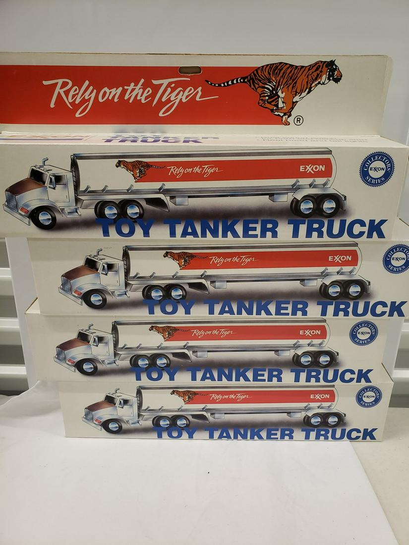 Lot of 4 Exxon Toy tanker trucks: Lot of 4 Exxon Toy tanker trucks