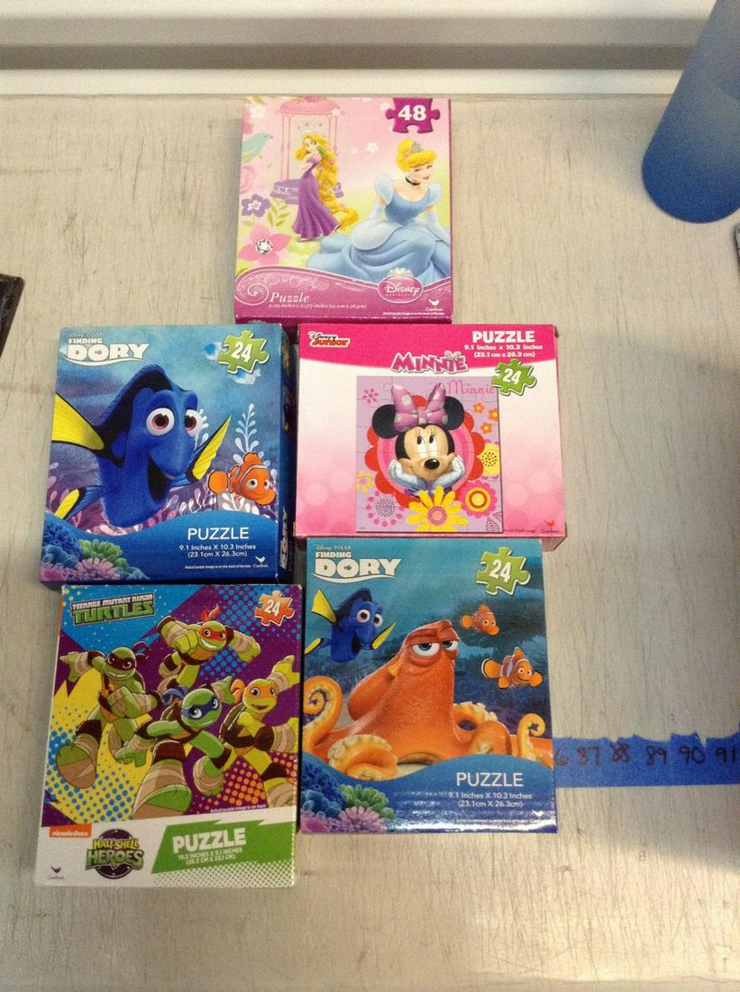 Various new puzzles in box: Various new puzzles in box
