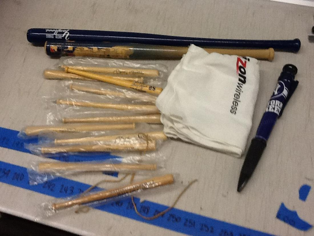 Lot of small baseball bats, bat pens, and New york (1 of 1)