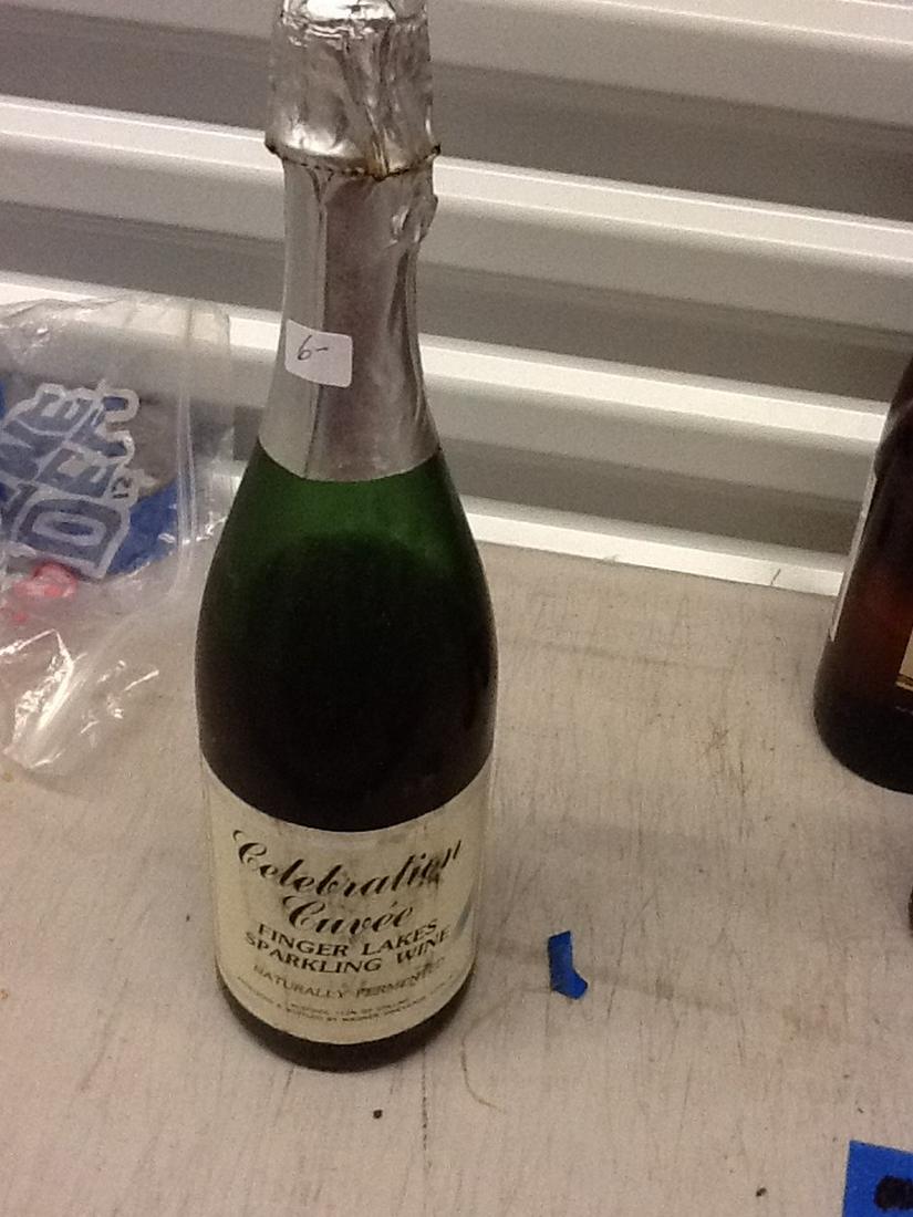 Celebration Cuvee Finger Lakes Sparkling Wine (JM): Any contents in bottle is Free; You are bidding on the bottle & unbroken tax stamp